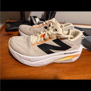 New Balance Cream and Black Running Shoes